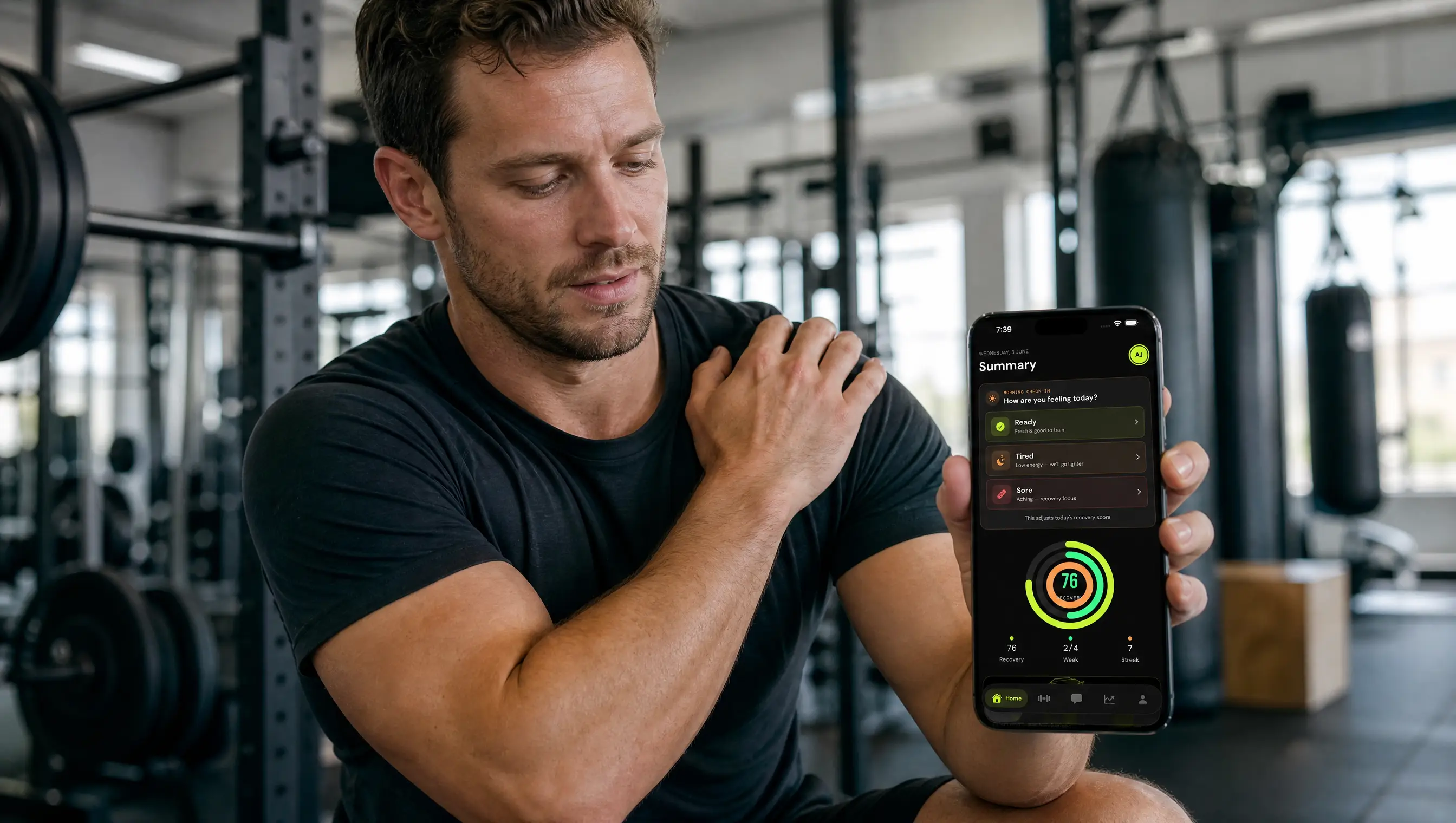 Man checking his morning check-in in the FitAI Coach app while feeling sore after a workout